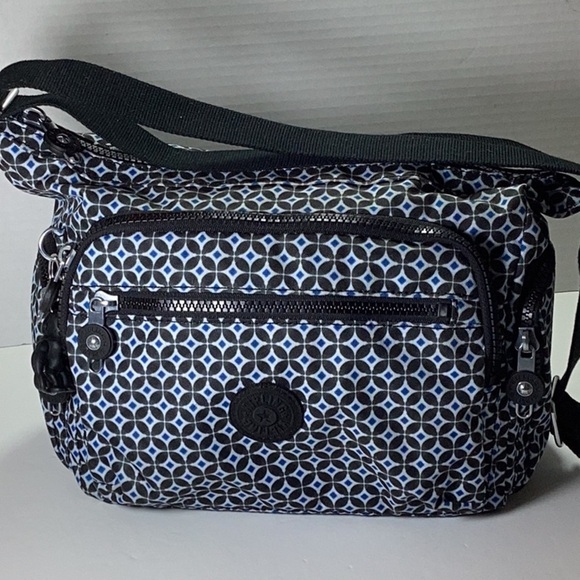 Gabbie Small
Printed Crossbody Bag. New without tag - Picture 7 of 9